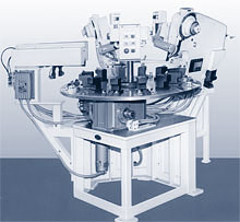 Model 2610 and 2620 Riveters are mounted at 15° angles to a 48 inch 12 station index table, to set 2 rivets in a tubular assembly